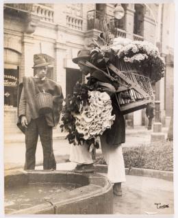 205   -  <span class="anexos">Foto vendedor de flores</span><br>