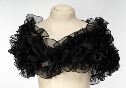 57   -  Hombrera. Carretel, década de 1980