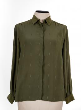 126   -  <span class="typology">Blusa. Yves Saint Laurent</span>. 