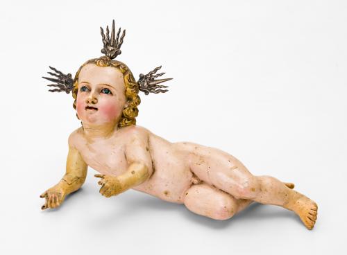 Niño Jesús recostado con urna de cristal con marco dorado
