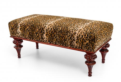 Banqueta tapizada con estampado de leopardo